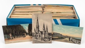 An accumulation of WORLD postcards in a completely filled shoebox, (100s).