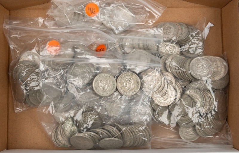 An accumulation of SHILLINGS comprising of 1958 (27), 1959 (42), 1960 (45), 1961 (82), 1962 (11) and 1963 (35). (Total: 242 coins).