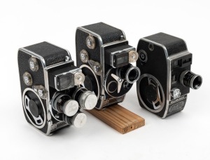 BOLEX-PAILLARD: Three double-8 movie cameras - one c. 1942 L8 with one lens, one c. 1958 D8LA with three lenses and all caps present, and one c. 1958 D8L with one lens. (3 movie cameras)