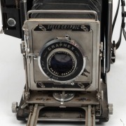 GRAFLEX: Speed Graphic folding 3&frac14; x 4&frac14;" plate camera, c. 1930, with Optar 135mm f4.7 lens [#884480] and Kalart Synchronized&nbsp;Range Finder attachment [#B90882]. - 2