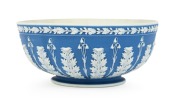 WEDGWOOD antique English blue Jasper Ware pottery bowl with acanthus and bellflower relief, circa 1850, impressed "WEDGWOOD", 7cm high, 17cm diameter