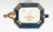 WEDGWOOD blue lustre ware teapot with gilt highlights adorned with Oriental figures, circa 1920s, factory mark to base "WEDGWOOD, ENGLAND" with amphora mark, additional retailer's mark "Manufactured for James Powell & Sons...", 9.5cm high, 17.5cm wide - 3