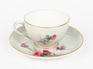 ROYAL WORCESTER antique English porcelain teacup and saucer, hand-painted with thistle decoration, signed "H. POWELL", puce factory mark to bases, the saucer 14.5cm diameter