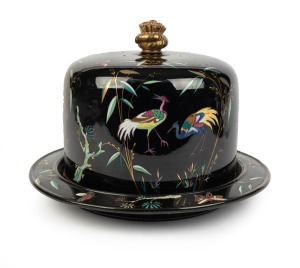 An antique English black porcelain cheese dish and cover with enamel decoration in the Chinese style, 19th century, 22cm high, 31cm diameter