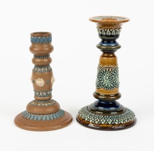 DOULTON LAMBETH two antique English stoneware candlesticks, 19th century, impressed factory mark to bases, 16cm and 14cm high