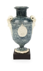 An antique English porcelain urn with face mask handles and classical vignette, circa 1780, bearing "Laver Collection" label to the base, 21cm high overall