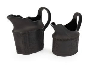 Two antique English black basalt pottery jugs with Etruscan decoration, early 19th century, 11cm and 10cm high