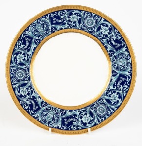 ROYAL WORCESTER English porcelain cabinet plate decorated with enamelled blue border and gilt rim, puce factory mark to base, 26cm diameter