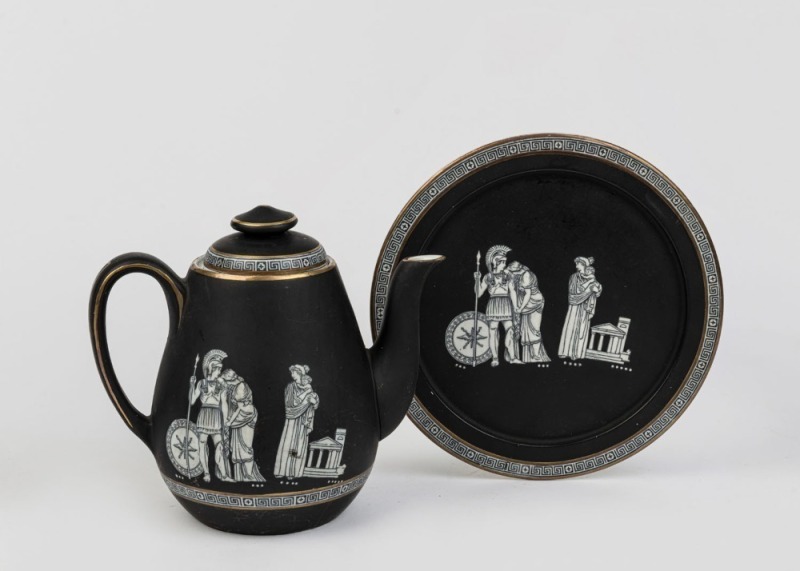 PRATTWARE antique English black porcelain teapot and trivet with classical scene and Greek key frieze, circa 1860, pictorial discus trademark to bases, the teapot 15cm high