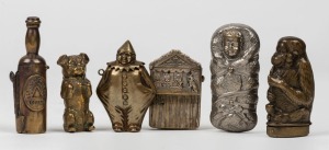 Six assorted novelty vestas including a bottle shaped example with cigar cutter end, pug dog, Punch & Judy, swaddled baby, smoking monkey and Pierrot clown, 19th and 20th century, (6 items), the largest 7.5cm high