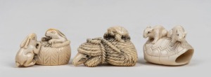 Three Japanese carved ivory netsukes comprising: turtle, rats and rabbits, Meiji Period, the largest 4.5cm wide