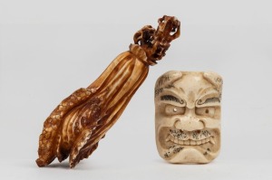 A Chinese carved ivory opium bottle in the form of a cabbage, together with a Japanese carved whalebone miniature Noh mask, 19th century, (2 items), the bottle 9.5cm high