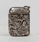 An antique Chinese export silver vesta with repousse dragon decoration, 19th/20th century, 5.5cm high - 2