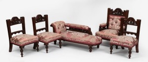 An antique English apprentice miniature salon suite, walnut frames with jacquard upholstery, comprising of a chaise lounge, gent's chair and three single chairs, late 19th century, (5 items), the chaise lounge 51cm long