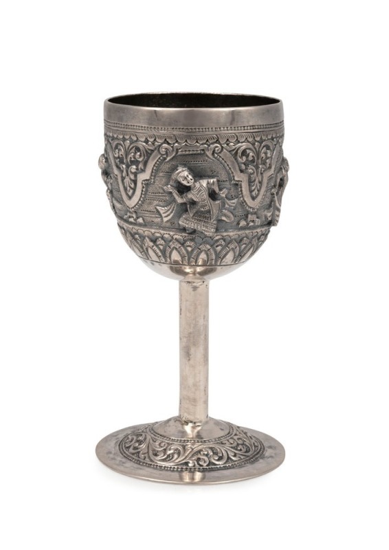 A Burmese silver goblet with repousse dancing figure decoration, 20th century, stamped "95% SILVER, BURMA", 11cm high, 92 grams