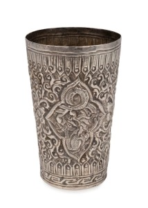 An antique Asian silver beaker with repousse and engraved decoration, unknown origin, 19th/20th century, 12.5cm high, 152 grams