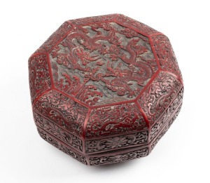 A Chinese cinnabar style lidded octagonal box, 20th century, seal mark to base, 13cm high, 21cm wide, 21cm deep