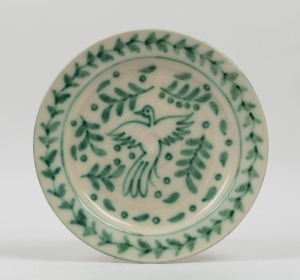 A vintage pottery charger with green leaf and bird motif, 32.5cm diameter