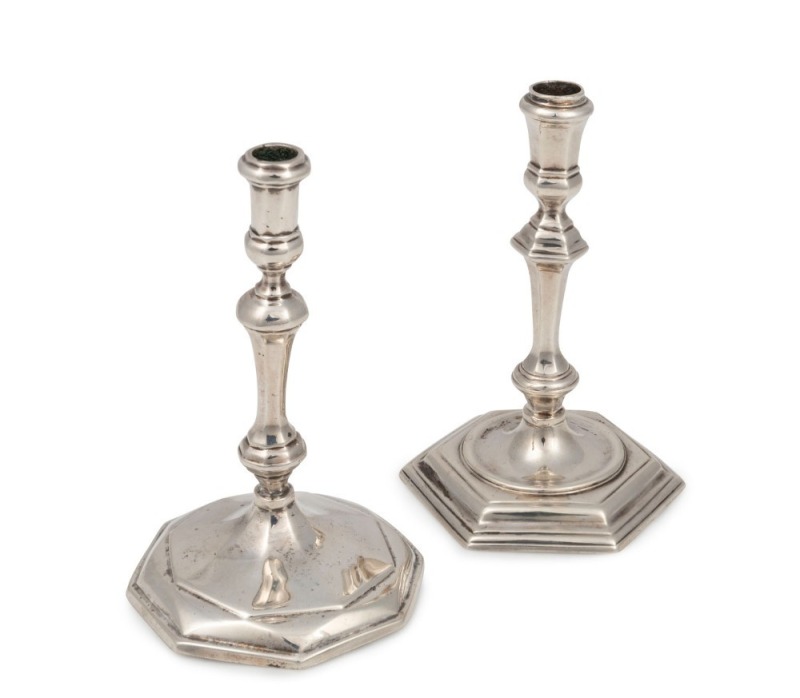 Two antique English solid cast sterling silver tapersticks, by Crichton Brothers of London, early 20th century, 11cm high, 244 grams total