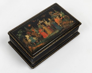 A Russian Palekh hand-painted lacquered box, signed lower centre and dated 1959, 6cm high, 20.5cm wide, 12cm deep
