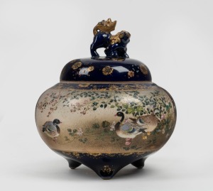 SATSUMA antique Japanese earthenware lidded pot on blue ground with floral decoration, gilt highlights and Foo dog finial, Meiji period, 19th/20th century, 13cm high
