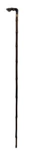 An antique walking stick with carved horn horse hoof handle, brass collar, bamboo shaft and steel ferrule, 19th century, 87cm high