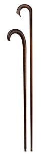 Two antique timber walking sticks, fiddleback blackwood and an unusual faceted albura example, 19th/20th century, ​​​​​​​78cm and 104cm high