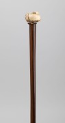 An antique walking stick with Japanese carved ivory fruit handle on a timber shaft with brass ferrule, 19th century, 95cm high - 2