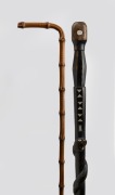 An antique walking cane, together with a tribal walking stick inlaid with pearl shell, 20th century, both 91cm high - 2