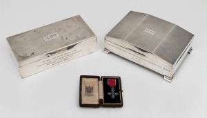 Two antique sterling silver presentation cigarette boxes, together with a miniature medalet C.B.E. (Commander Of The Order Of The British Empire), all dedicated to The Honourable R.T.B. WYNN C.B.E, (3 items), the two boxes 1000 grams total (including cedar linings)