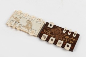 Two antique Japanese whist counters, one in carved ivory, the other in rosewood with Shibayama decoration, Meiji period, 19th/20th century, 9cm wide