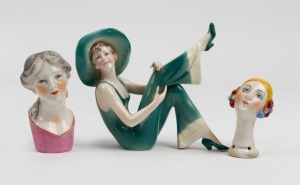 MEISSEN (attributed) antique German porcelain figural parasol handle, together with a German porcelain statue of a reclining lady in green, and an Art Deco porcelain cosey doll bust, (3 items), the largest 10cm high