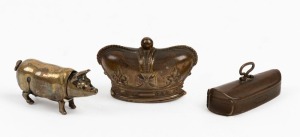 Three assorted novelty vestas comprising a pig, violin case, and a crown, 19th/20th century, ​​​​​​​the violin case 5cm high