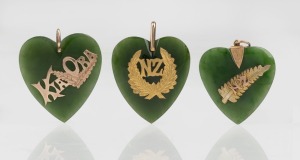 Three antique New Zealand greenstone heart shaped pendants, mounted in 9ct gold, emblazoned "N. Z." and "Kia Ora", 19th century, the largest 4cm high