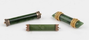 Three antique New Zealand greenstone and 9ct gold bar brooches, 19th/20th century, the largest 6cm wide