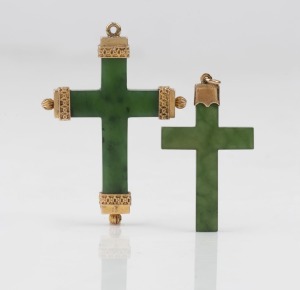 Two antique New Zealand greenstone cross pendants, mounted in 9ct yellow gold, 19th/20th century, the larger 5.3cm high