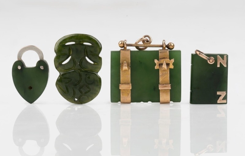 Antique New Zealand greenstone and 9ct gold pendant in the form of a satchel, together with a book form pendant mounted in gold, a heart lock with white metal mount and a Tiki pendant, 19th and 20th century, (4 items), the satchel 3cm wide