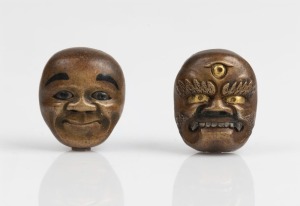 MENUKI pair of face mask antique Japanese bronze sword fittings, 19th century,