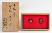 MENUKI&nbsp;pair of face mask antique Japanese bronze&nbsp;sword fittings, 19th century, - 2
