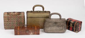 Five assorted vintage and antique tins in the form of luggage, early 20th century, the largest 22cm high