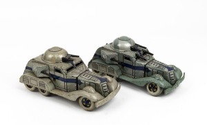 Two vintage Japanese clockwork tinplate armoured cars by T.N. TOYS, 20th century, 23cm long