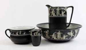 GRIMWADES antique English porcelain four piece wash set with classical frieze on black ground, comprising of a wash jug, basin, chamber and brush pots, early 20th century, (4 items), black factory mark to bases, the jug 32cm high