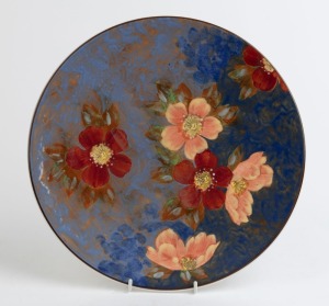 ROYAL DOULTON floral patterned porcelain charger on blue ground, 20th century, green factory mark to base, 34cm diameter