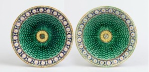 WEDGWOOD pair of antique green Majolica basket weave plates with floral borders, 19th century, impressed "WEDGWOOD", 22cm diameter