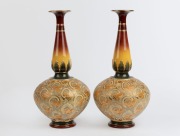 ROYAL DOULTON pair of antique&nbsp;pottery vases with gilded highlights, early 20th century, impressed factory mark to bases, 44cm high