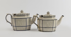 A pair of antique English pottery teapots with sprig moulded decoration and blue and black trim, circa 1810, 13cm high, 25cm wide