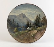 An antique French faience&nbsp;pottery plaque with hand-painted landscape scene, signed on reverse "Dent du Midi" with monogram mark, 36cm diameter