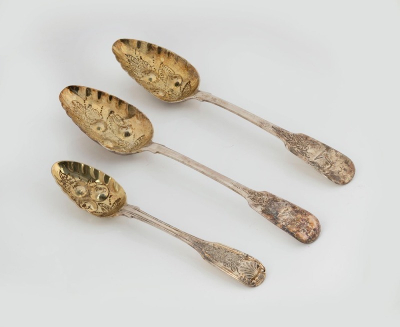 Three antique sterling silver berry spoons, 19th century