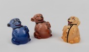 ROYAL DOULTON "Bonzo" group of three miniature porcelain figures modelled by CHARLES NOKE, circa 1920, stamped "Doulton" with impressed model numbers, 4.5cm high