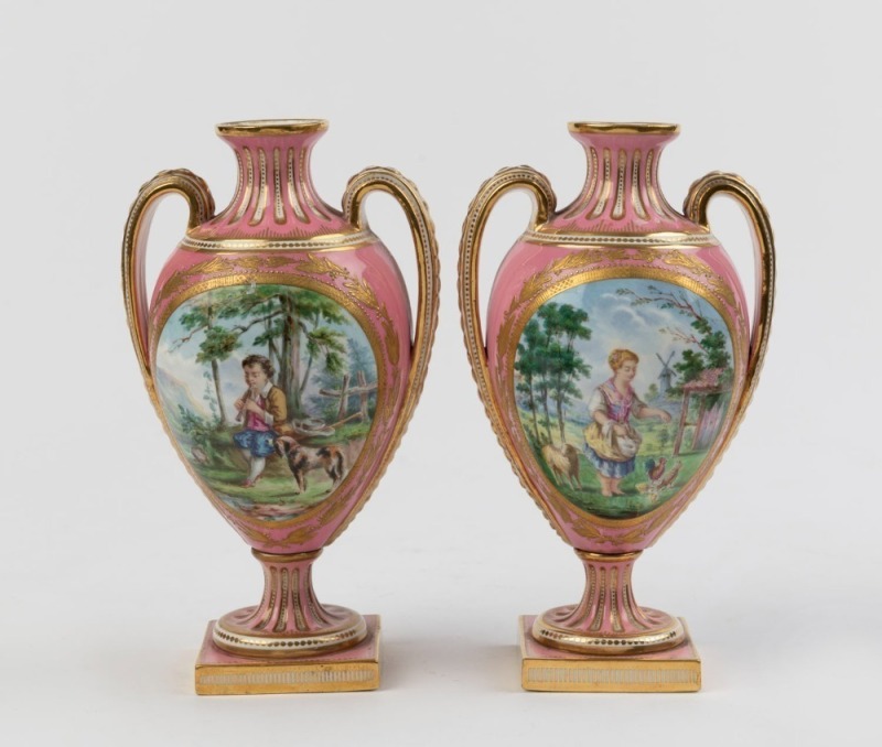 MINTON pair of antique English porcelain two handled mantle vases, hand-painted parstoral scene vignettes on Rose Du Pompadour ground with richly gilt borders and foot, circa 1870, 18.5cm high